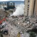 OSMANIYE, TURKIYE - FEBRUARY 06: An aerial view of debris as rescue workers conduct search and rescue operations on a collapsed building after the 7.4 magnitude earthquake hits Osmaniye, Turkiye on February 06, 2023. (Photo by Muzaffer Cagliyaner/Anadolu Agency via Getty Images)